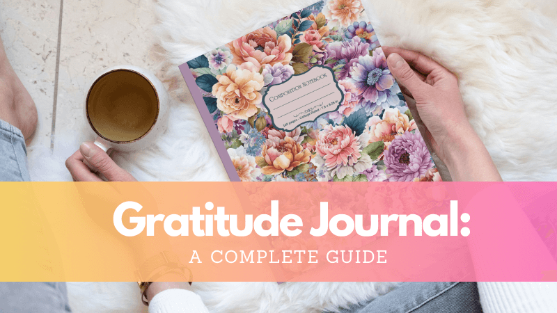 Person holding a floral gratitude journal with a cup of coffee beside them